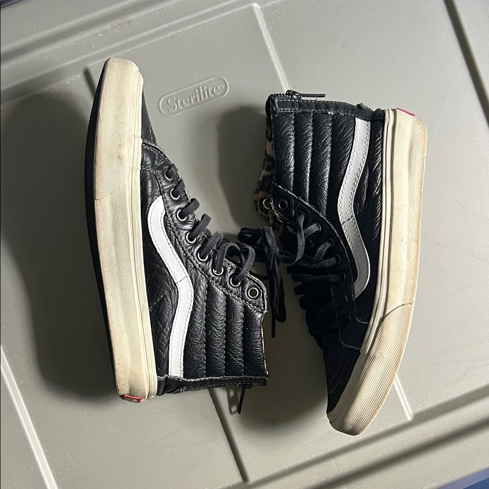 Vans Black and White High-Top Sneakers